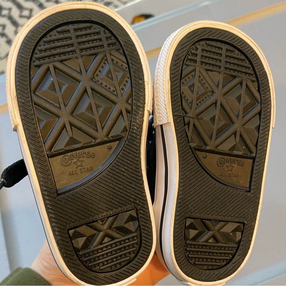 Converse baby/toddler size 4 slip in shoe, black leather. Never worn.